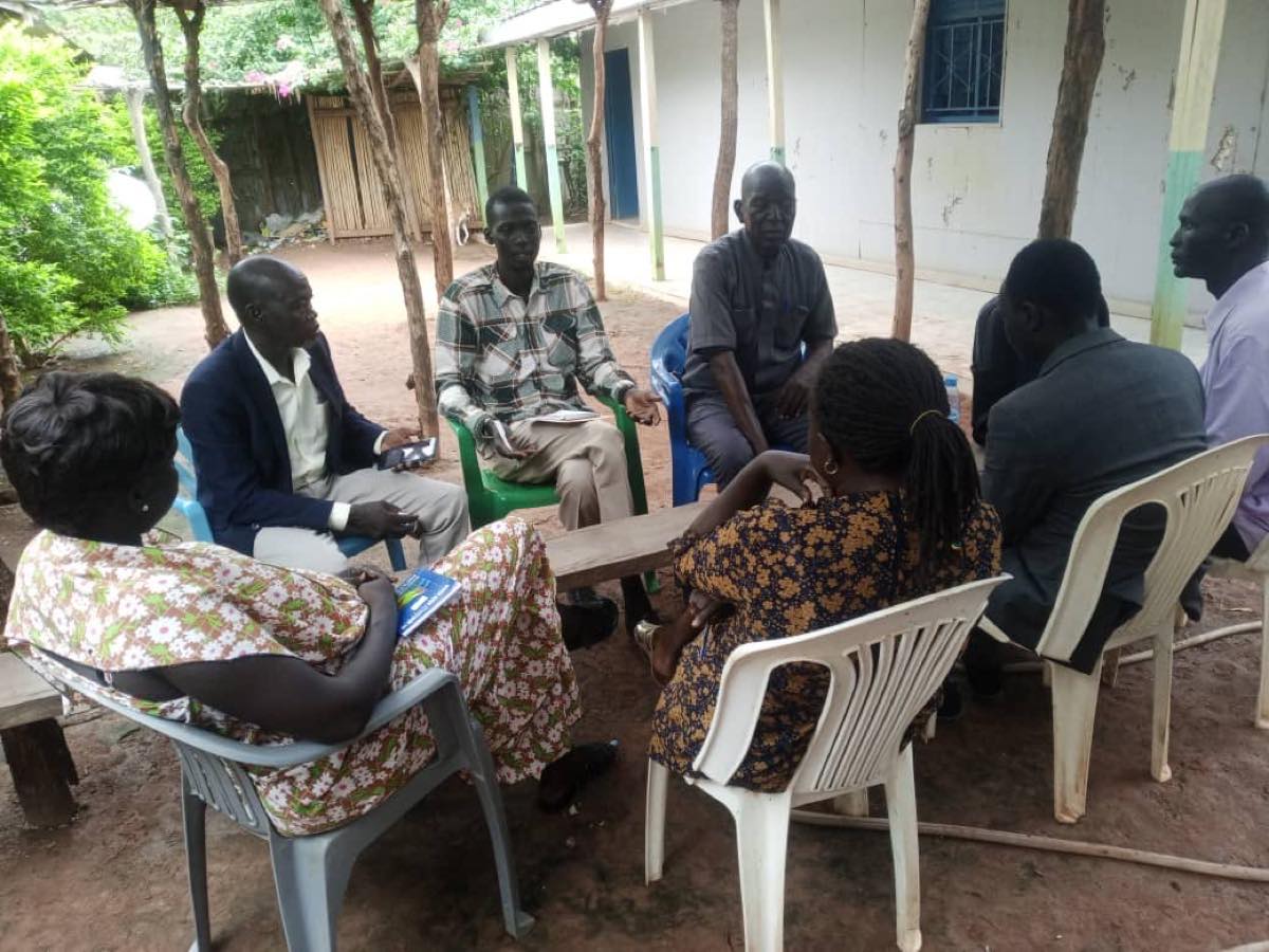 DARD Program Officer Debora Adut Maker consults with stakeholders on the localization agenda in Rumbek town